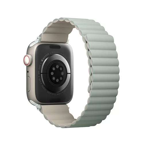 На фото изображено Ремешок силиконовый двусторонний Uniq для Apple Watch (44,45,46,49 мм), шалфей-бежевый