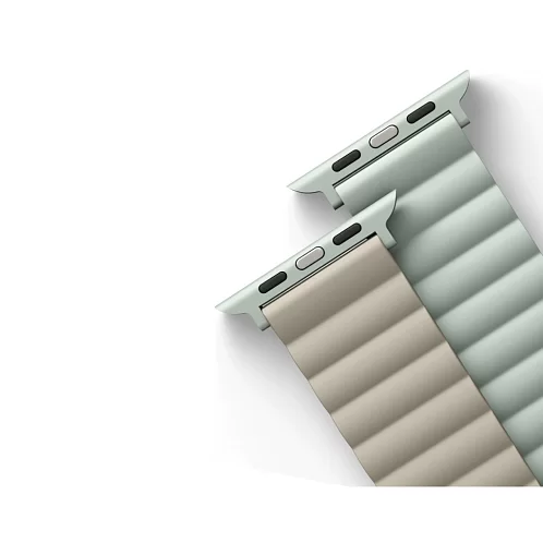 На фото изображено Ремешок силиконовый двусторонний Uniq для Apple Watch (40,41,42 мм), шалфей-бежевый